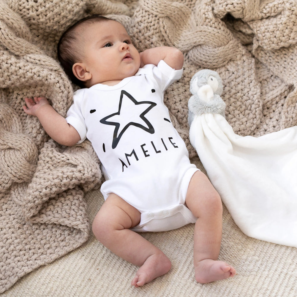 Personalised Christmas Star Babygrow by Clouds & Currents