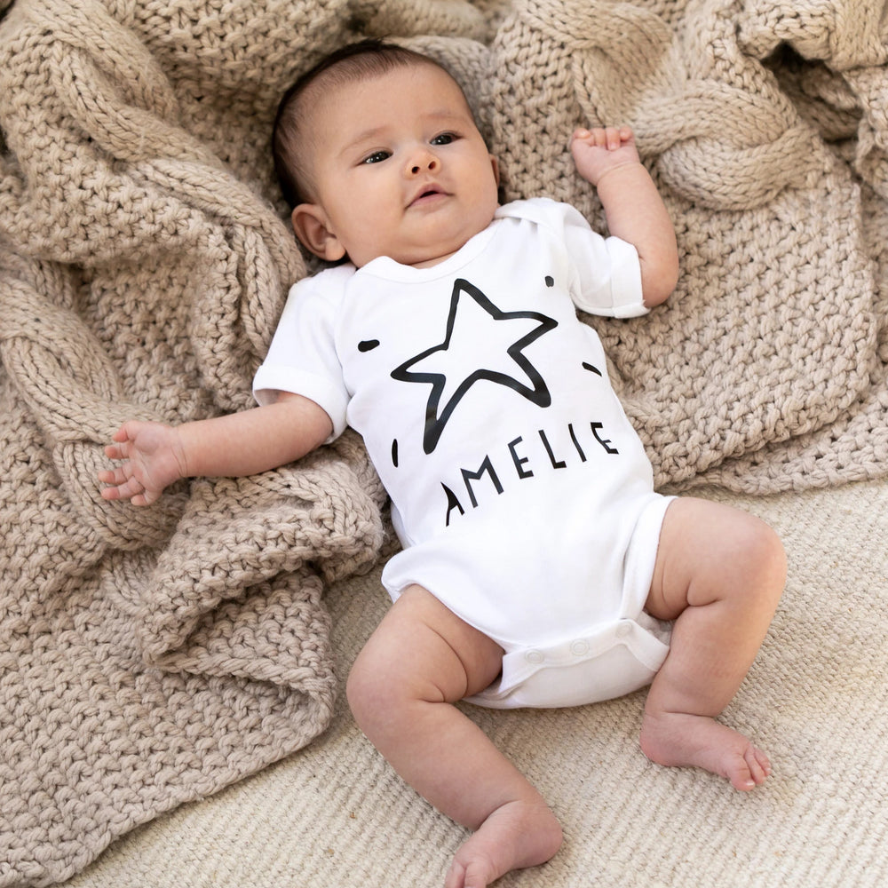 Personalised Christmas Star Babygrow by Clouds & Currents