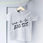 Big Sis Soon To Be Kid's T Shirt by Clouds and Currents