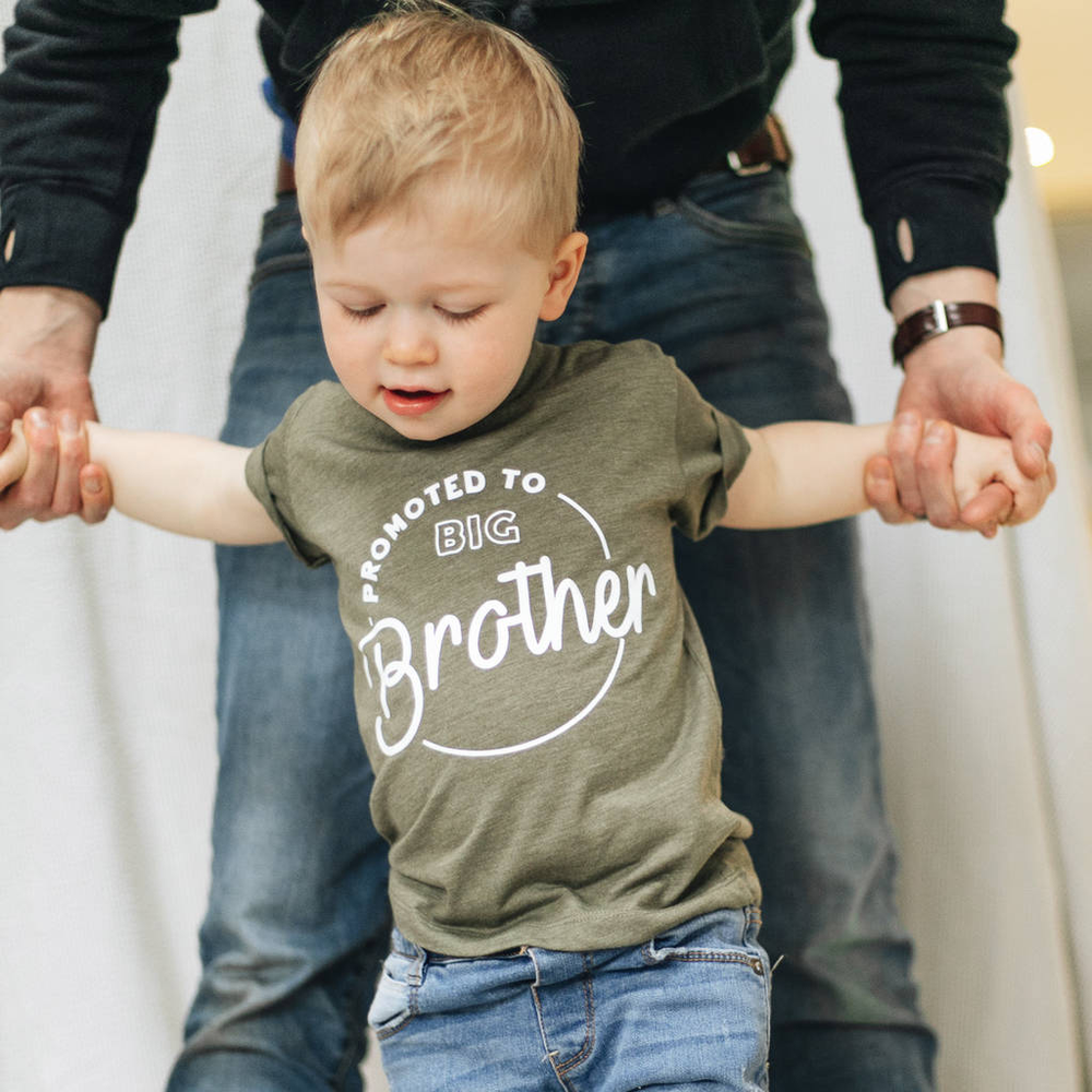 Promoted to Big Brother Kid's T Shirt by Clouds & Currents