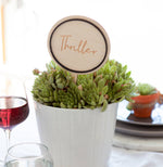 Circular Wedding Table Names by Clouds & Currents
